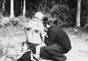 Svetlana and her father picking the first mushrooms