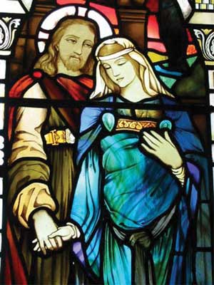 Magdalena expects her firstborn. A stained-glass window in the church of Kilmore (Scotland)